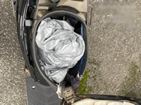 放置バイクの荷物入れの写真