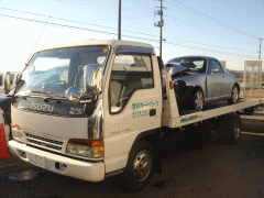 青森県での廃車引取りを担当する積載車